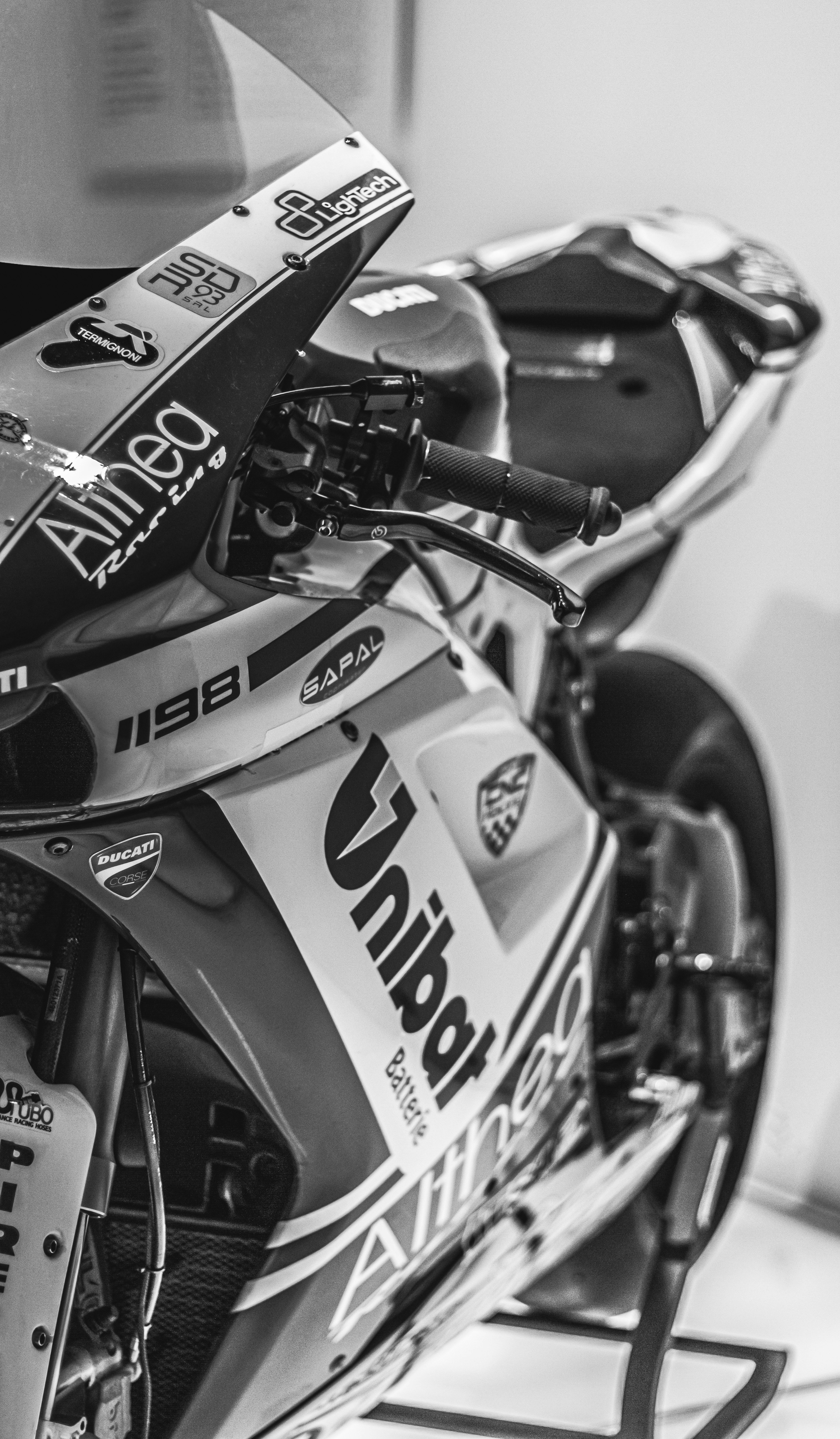 grayscale photo of honda motorcycle